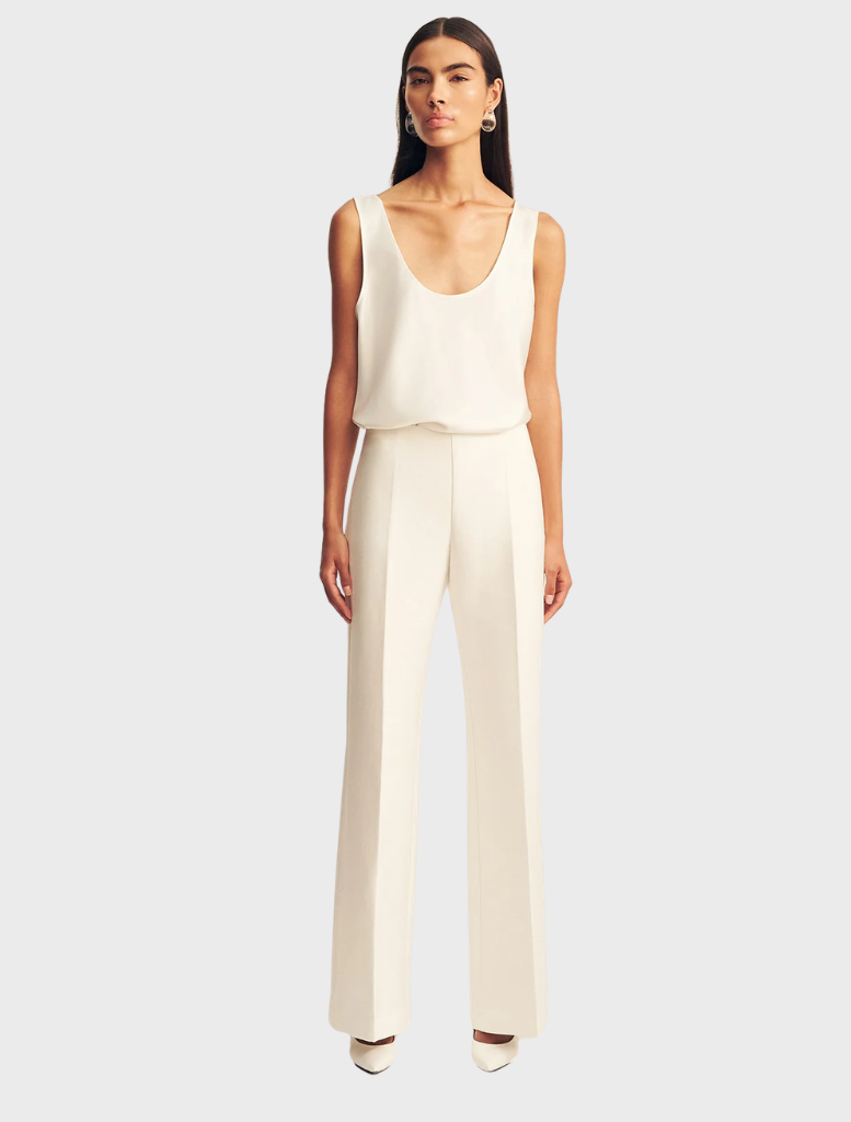 Ivory Otis Pant displayed on a hanger, showcasing its sleek design and fabric texture.