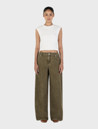 Khaki Paige Denim jeans displayed on a white background, showcasing a classic five-pocket design and a slim fit.