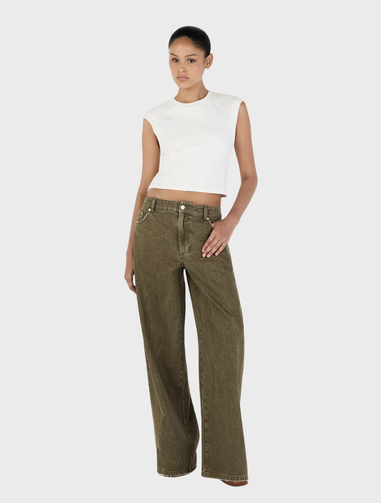 Khaki Paige Denim jeans laid out, emphasizing their stylish design, pockets, and soft fabric texture against a neutral backdrop.
