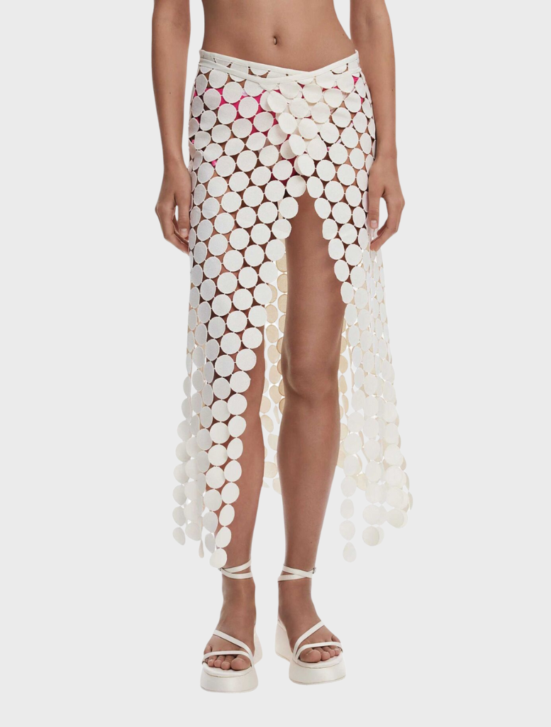 White pareo featuring a circular pattern, ideal for beachwear or casual summer outfits.