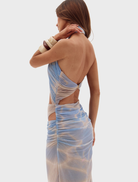 Flowing long dress showcasing a bold print, designed for comfort and fashion.