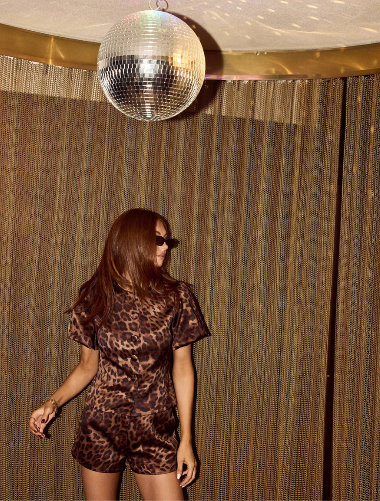 Trendy leopard print shorts featuring a bow accent, perfect for a chic summer outfit.