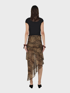 Leopard print fabric defines the Phaedra Skirt by Sirocco, adding a trendy touch.