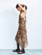 The Phaedra Skirt from Sirocco is crafted from eye-catching leopard print fabric.