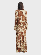 Noa Panelled Maxi Skirt showcasing a colorful Pineapple Wallflower design, ideal for adding flair to any outfit.