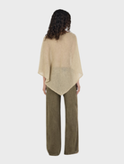 Pistachio-colored Simona Poncho, showcasing a modern and elegant style for versatile wear.