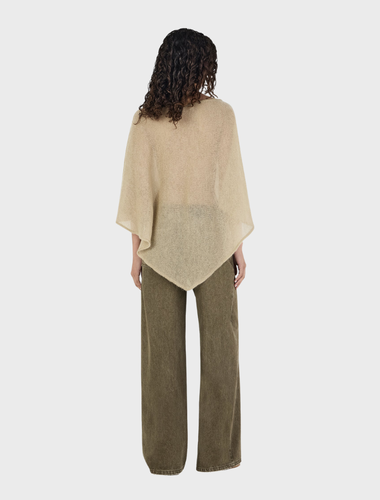 Pistachio-colored Simona Poncho, showcasing a modern and elegant style for versatile wear.