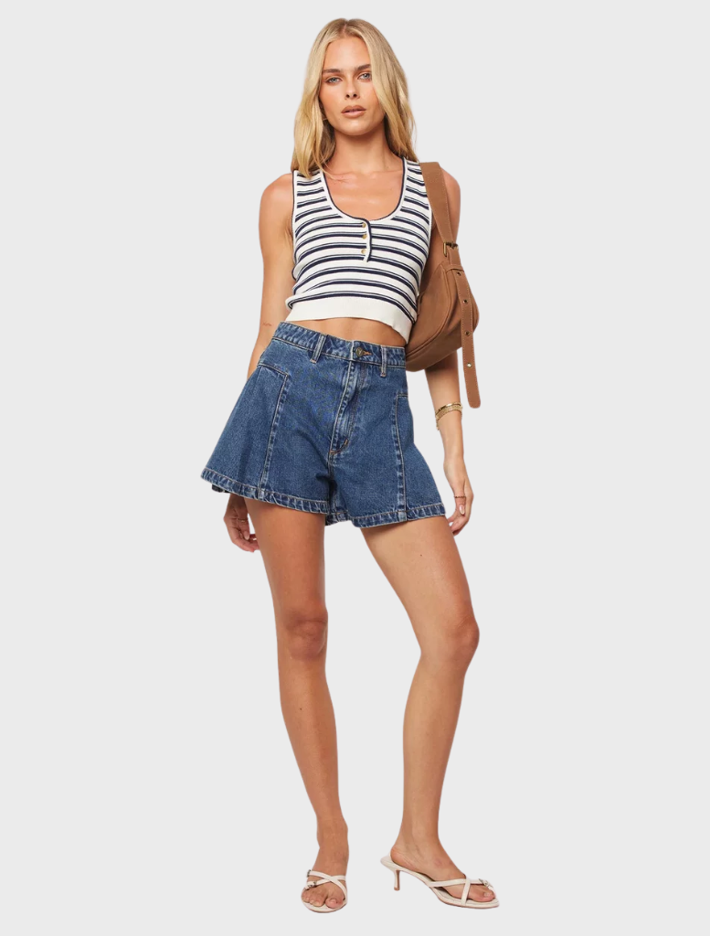 Stylish mid blue pleated shorts from Bella, perfect for enhancing your summer wardrobe with a trendy touch.