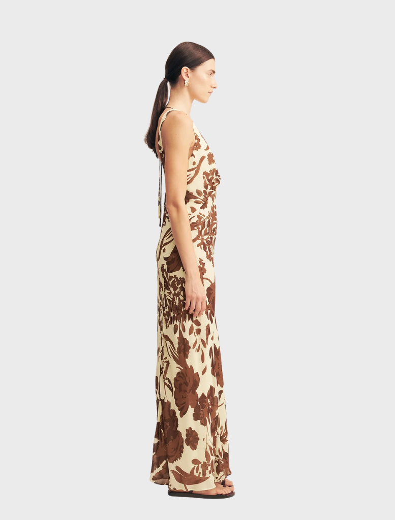 Noa Plunged Maxi Dress with a bright Pineapple Wallflower motif, offering a fashionable option for sunny days.