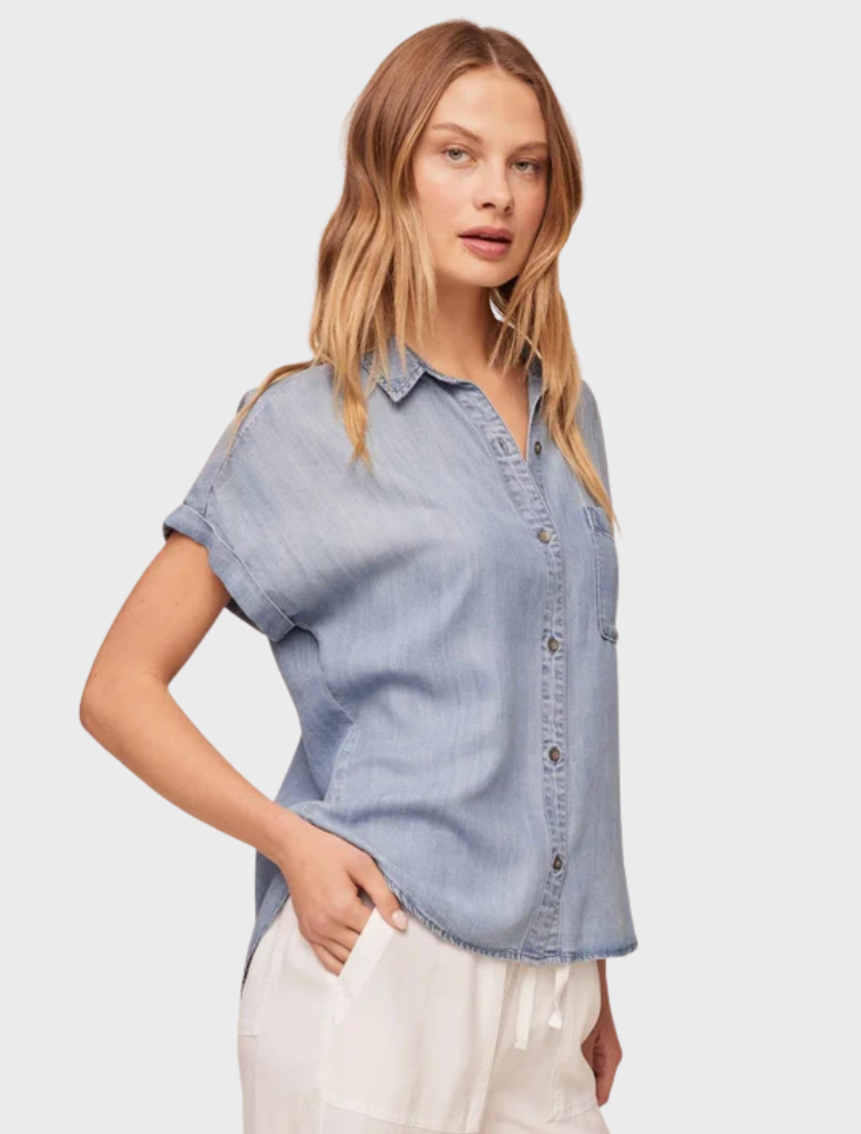 Casual short sleeve button-down shirt in faded blue with a pocket on the chest.