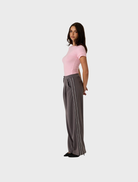 Zarah Baby Tee in eye-catching pop pink, combining comfort and style for a versatile addition to any casual wardrobe.
