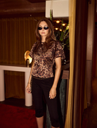 Poppy bubble sleeve blouse featuring a stylish leopard print design, perfect for a trendy and chic look.
