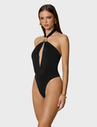 Elegant black Portia bodysuit with a fitted silhouette, ideal for stylish outfits or casual wear.