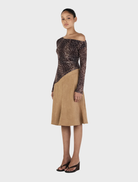 Paige's long sleeve top adorned with a Bambi motif, perfect for those seeking a blend of style and whimsy.