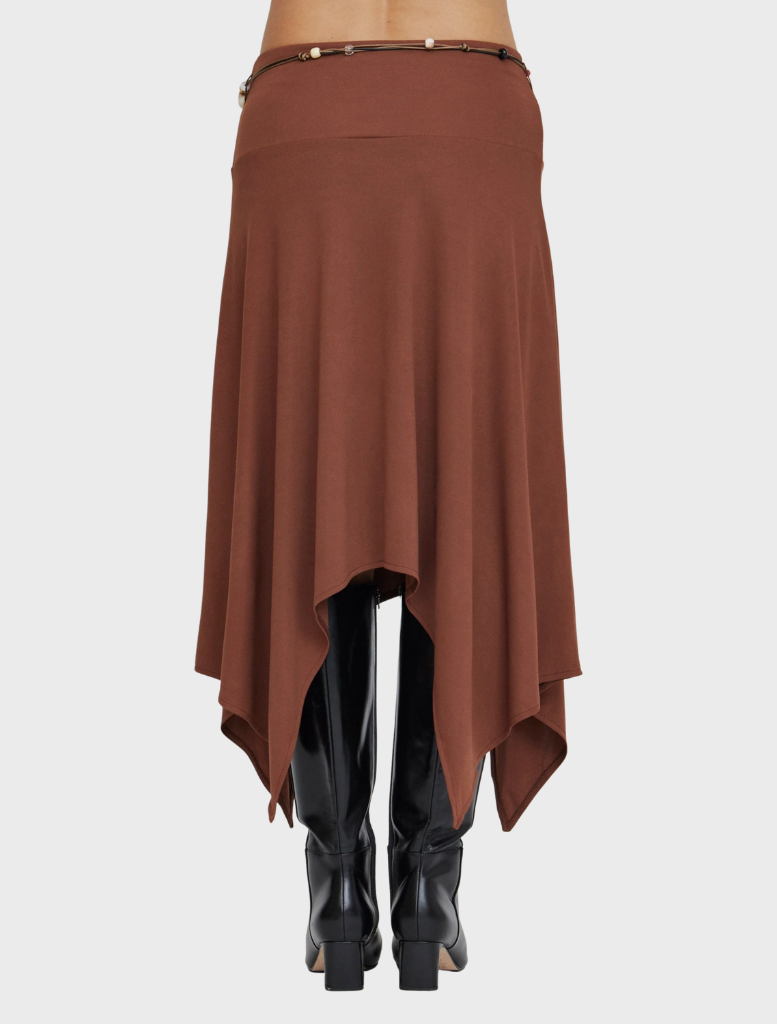 Elegant espresso skirt with a prism motif and handkerchief hem, perfect for adding a chic touch to any outfit.