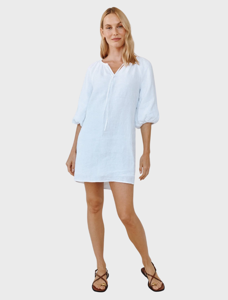 White pullover dress featuring puff sleeves, designed for a stylish and comfortable fit.