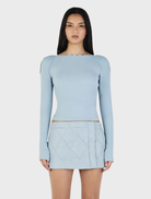 Ice blue long sleeve top by Quinn, featuring a relaxed fit and soft fabric, perfect for casual or layered outfits.