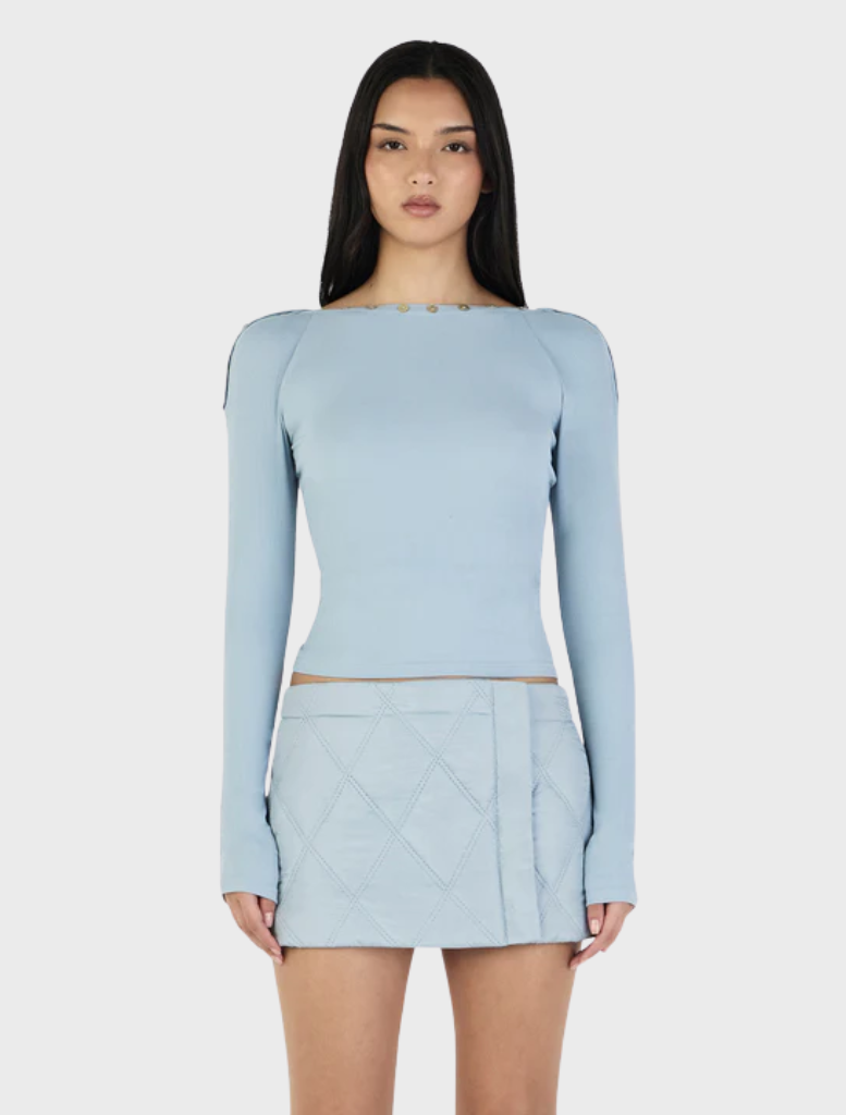 Ice blue long sleeve top by Quinn, featuring a relaxed fit and soft fabric, perfect for casual or layered outfits.