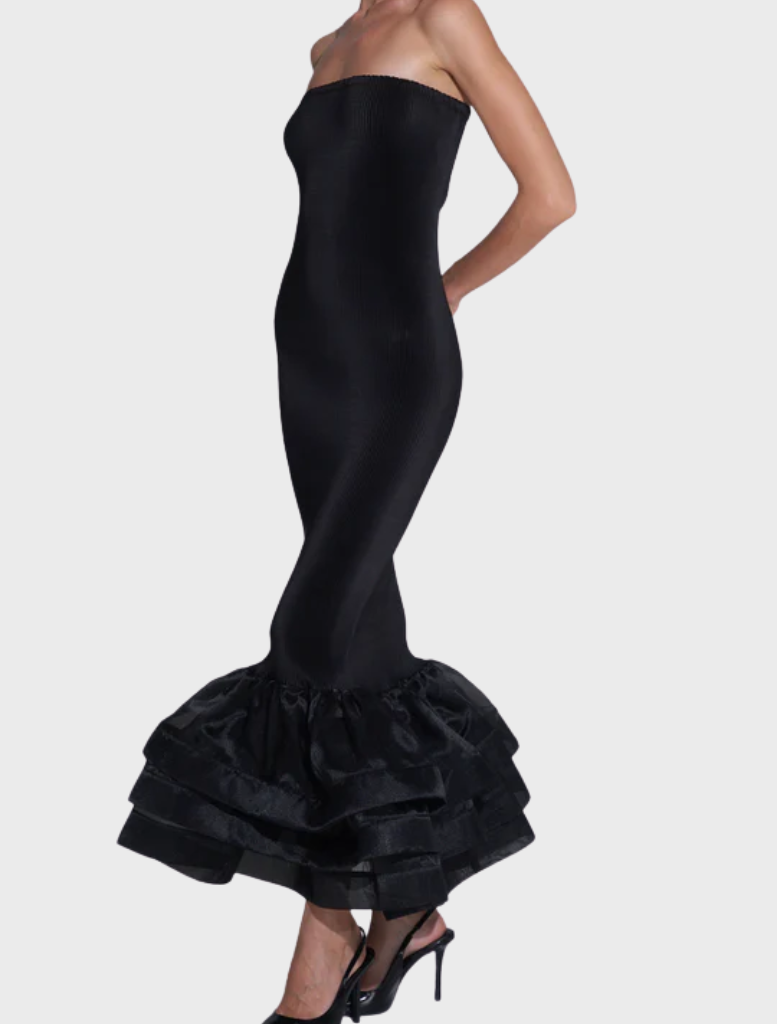Chic black Ramblas dress showcasing a tailored fit and soft fabric, suitable for sophisticated gatherings.