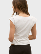White rani blouse with intricate embroidery and a traditional design, suitable for festive occasions or formal events.