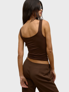 A chocolate Ray Tank, elegantly designed to serve as a decorative piece in contemporary living spaces.