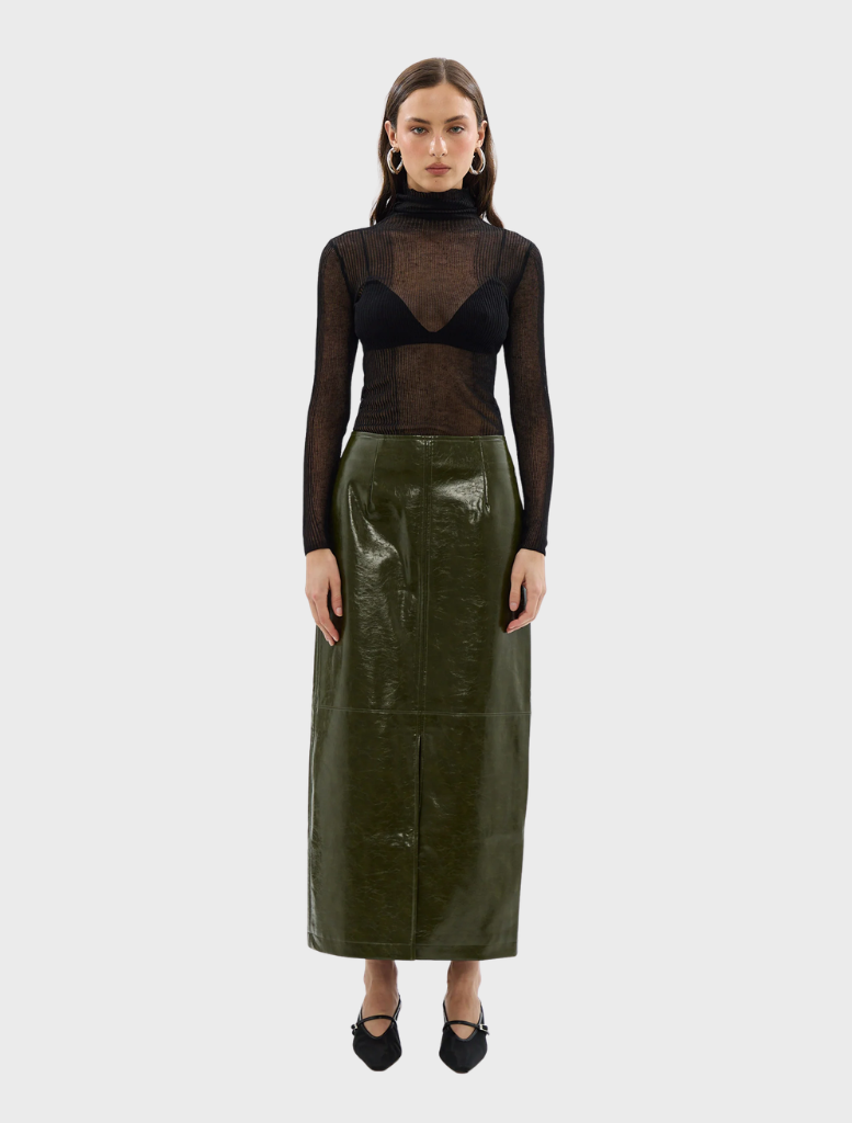 Close-up of a khaki Raye maxi skirt, highlighting its fabric texture and elegant drape.