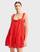  A red rose mini dress with scalloped tiers, showcasing a playful and elegant design perfect for various occasions.