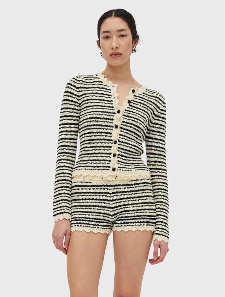 Cream and coffee-colored belted knit shorts, showcasing a stylish and comfortable design for casual wear.