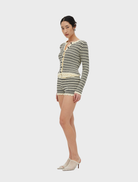 Cream and coffee belted knit shorts, combining comfort and style for versatile summer fashion.