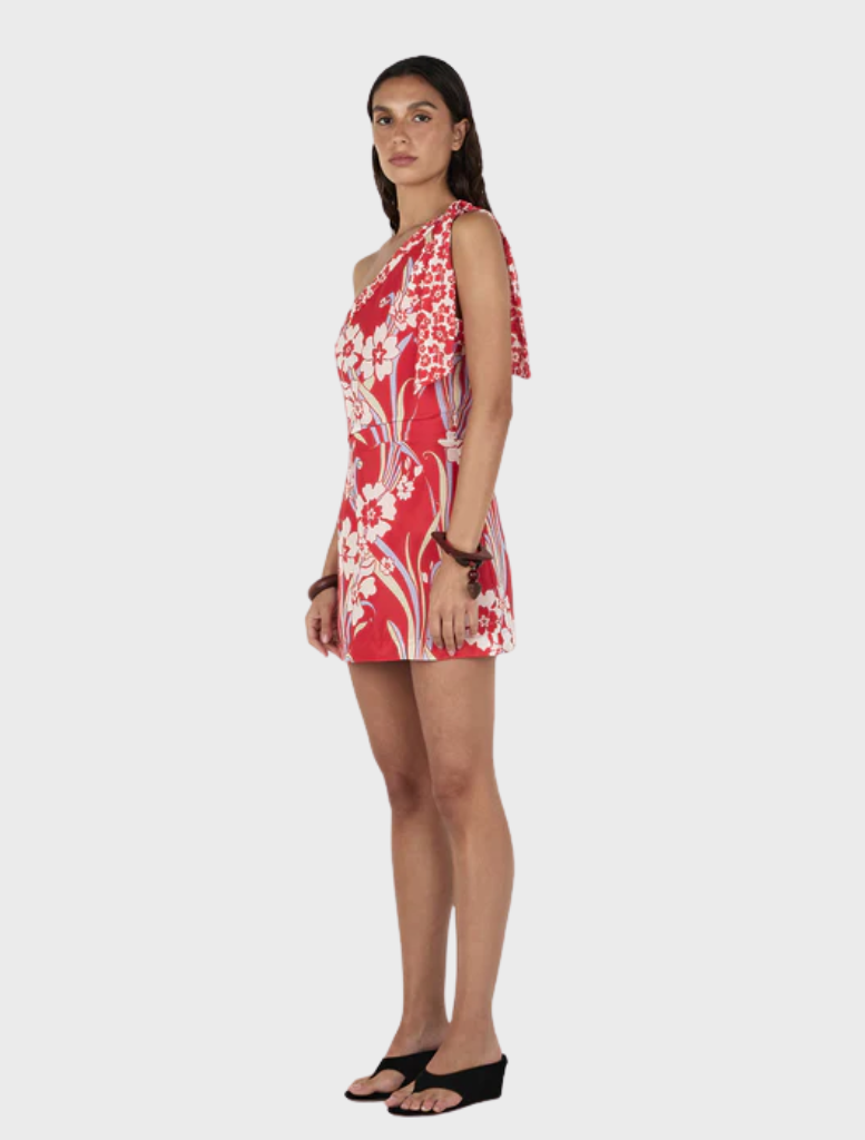 Allie Mini Dress displaying a bright retro Hawaiian motif, complete with short sleeves and a stylish flared cut.