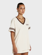 Contemporary Reverie V Neck top in Vanilla and Espresso, offering a relaxed fit and timeless style for versatile layering.