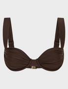 Chocolate Rhodes top displayed on a hanger, featuring a sleek design and soft fabric texture.