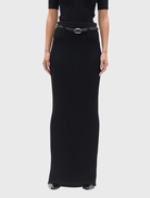 Black ribbed knit Rhylin Skirt with a wide waistband, belt loops, and a fitted design that falls to a maxi length.