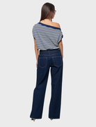 A close-up of Rinse Recycled 99 Low & Baggy jeans, emphasizing their relaxed fit and environmentally conscious production.