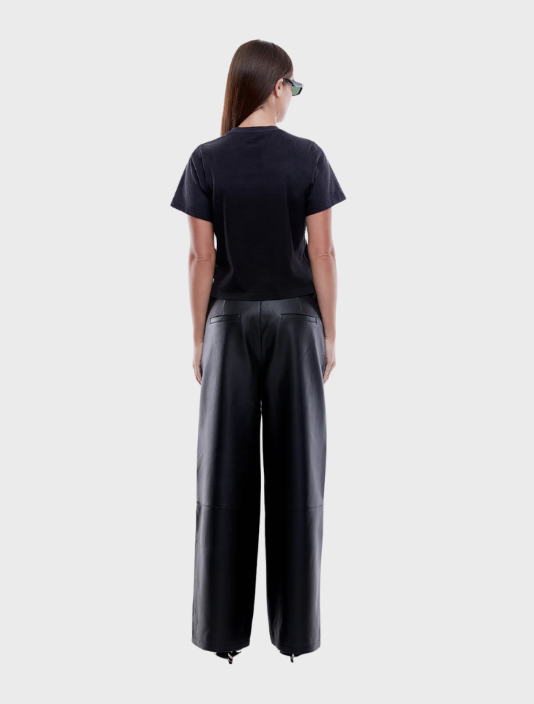 Stylish black leather pants with a slim fit, offering a versatile addition to any wardrobe for various occasions.