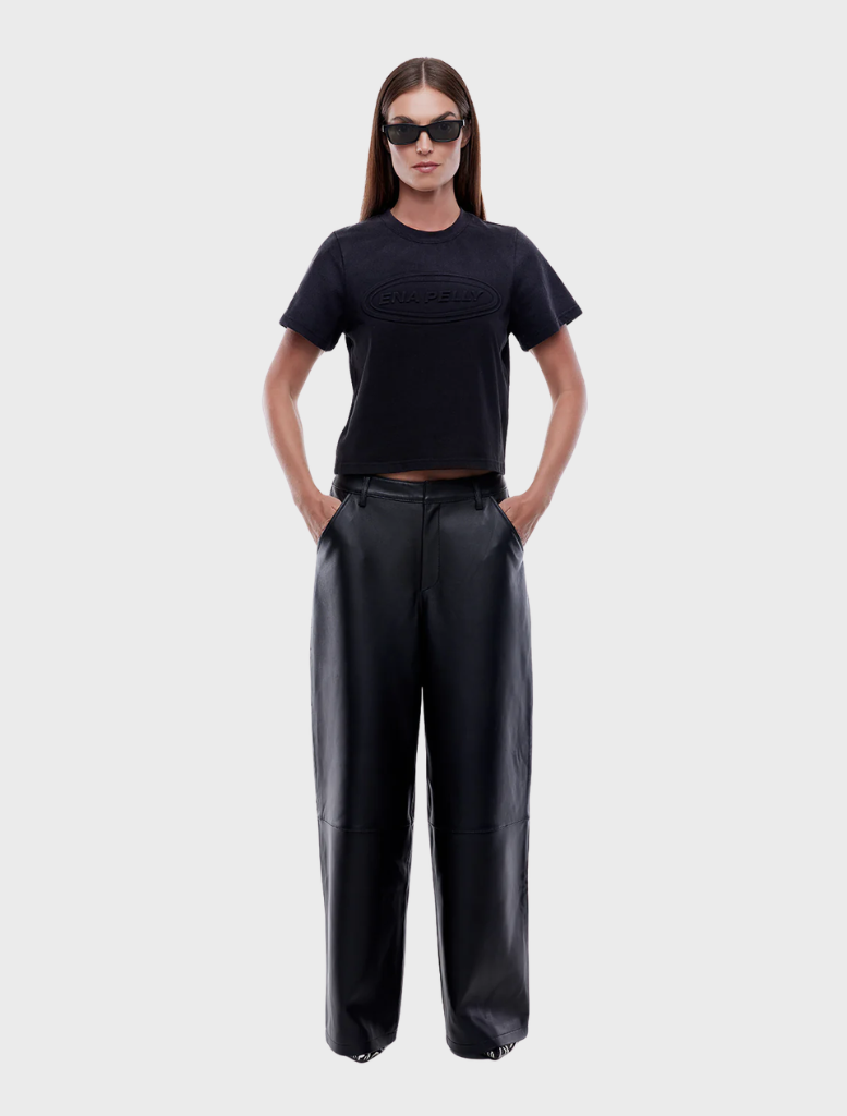 Black leather pants designed for a sleek, stylish look, featuring a fitted silhouette and modern design elements.