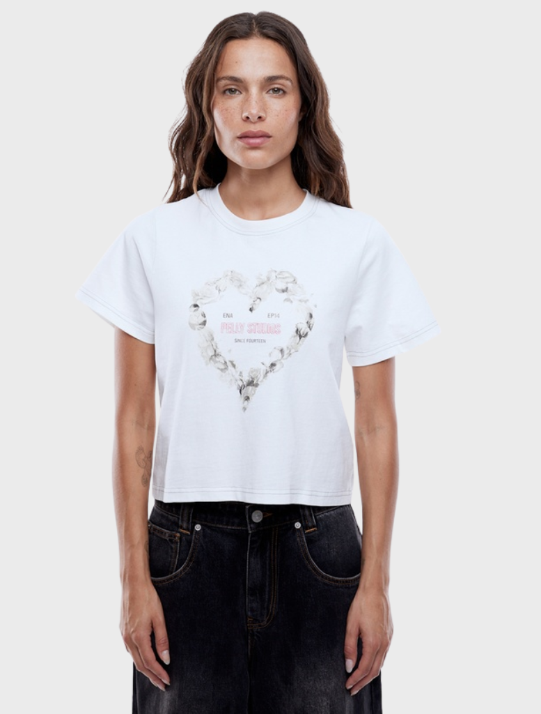 Vintage white baby tee featuring a rose heart design, perfect for a relaxed and stylish look for infants.