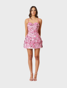 Pink Roseate Floral Mini Dress featuring a vibrant floral design.