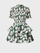 A floral mini dress featuring a vibrant rose design, short sleeves, and a playful silhouette ideal for warm weather.
