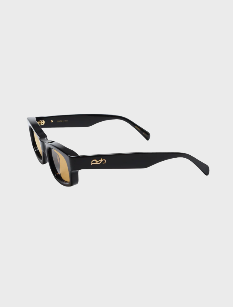 Chic black Bloom gown showcasing a sleek fit and refined accents, suitable for upscale gatherings and parties.