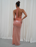 Rtw Lilou Dress in coral, highlighting a chic design and soft fabric, perfect for summer gatherings and events.