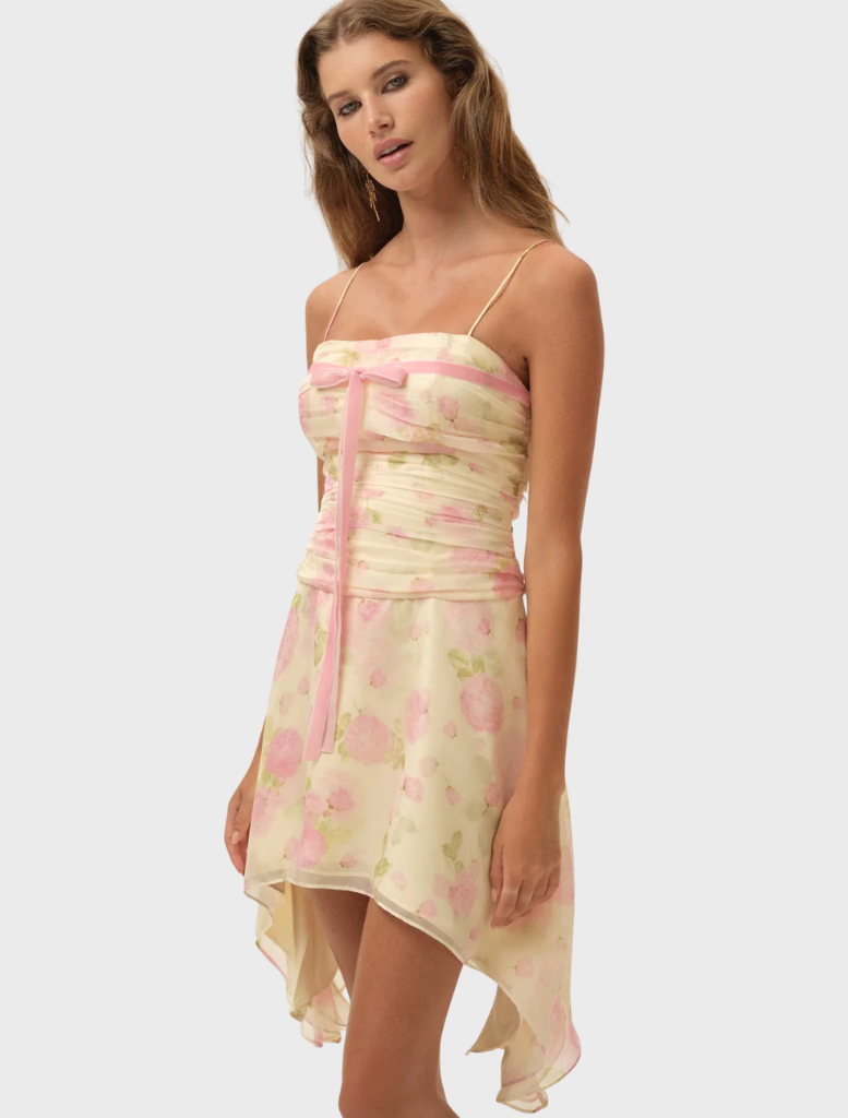 Soft yellow Rue mini dress with a fitted silhouette and short sleeves, perfect for casual summer outings.