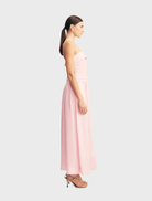 Gigi Strapless Maxi Dress featuring a vibrant Sakura floral design, offering a graceful and stylish option for summer events.