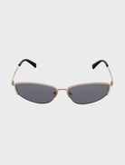 A vibrant Santal tree in a lush environment, with sunlight filtering through its leaves, emphasizing its natural beauty.