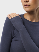 Close-up of the Brooklyn Top in sapphire blue, highlighting its stylish cut and smooth material.