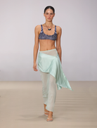 Elegant seafoam silk skirt by Vesper, showcasing a soft drape and refined style perfect for formal or casual wear.