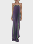 Sophisticated black tie gown featuring a strapless neckline and V detail, ideal for stylish movement at upscale events.