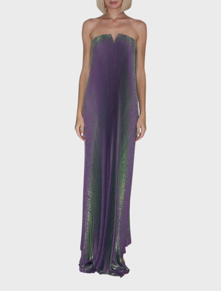 Sophisticated black tie gown featuring a strapless neckline and V detail, ideal for stylish movement at upscale events.