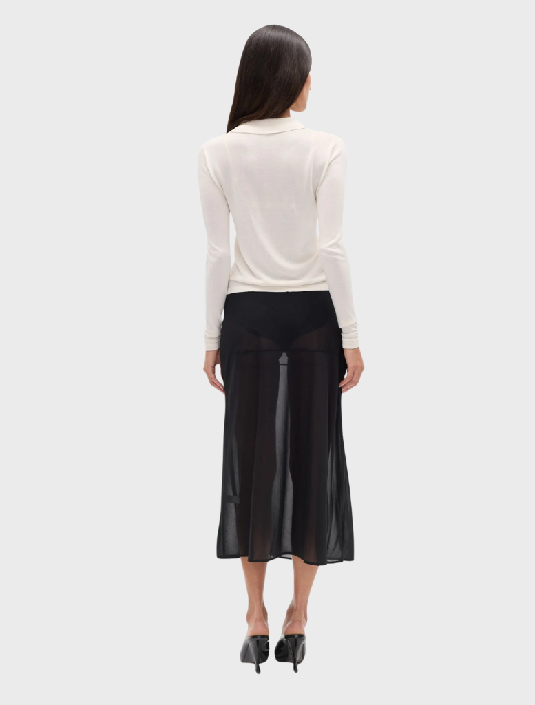 Classic ivory Shea Knit Top with a cozy feel, versatile for both casual and layered fashion looks.