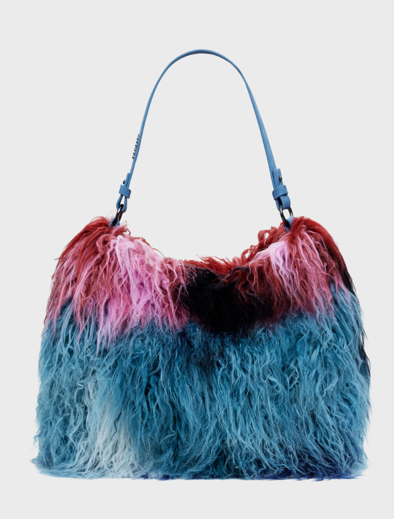 A multi-colored fur shoulder bag, showcasing vibrant hues and a stylish design.